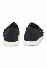 Dark navy suede shoes with a smooth texture, white rubber sole, and a buckle accent on the side, featuring a rounded toe design.