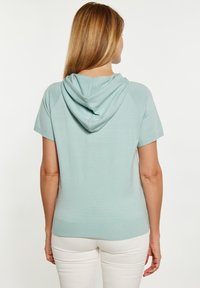 Felpa celeste con cappuccio, a maniche corte e orlo a costine, realizzata in tessuto morbido, con una vestibilità comoda e design della scollatura posteriore.