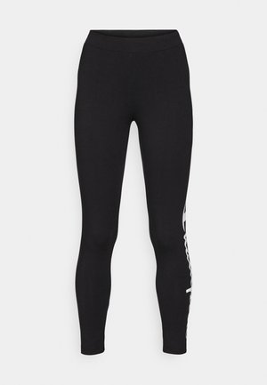 Sorte leggings med en glatt tekstur, høy midje og hvit logo detalj nedover venstre side. Tettsittende design, full lengde.
