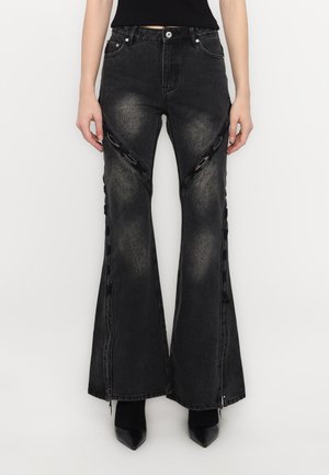 DECONSTRUCTION LACE UP - Flared Jeans - black