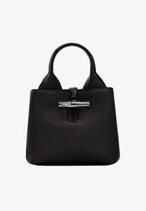 Black leather handbag featuring a textured surface, short handles, and a silver-tone clasp at the top for closure.
