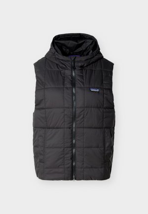 Μαύρο αμάνικο γιλέκο καπιτονέ με φερμουάρ μπροστά και κουκούλα, με μικρό λογότυπο Patagonia στο στήθος.