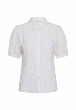 Blusa blanca texturizada de manga corta con mangas abullonadas, cierre de botones en la parte delantera y cuello clásico puntiagudo.
