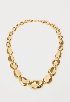 Gold necklace featuring oval-shaped links with a smooth, reflective surface. The design consists of alternating sizes, completing a seamless chain.