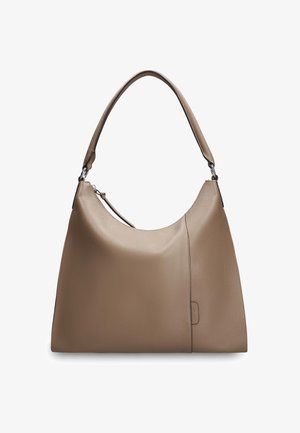 Taupe leather shoulder bag with curved top, single handle, and subtle stitching detail on front side.