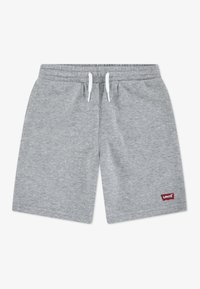 Shorts en coton gris avec une ceinture élastique et un cordon blanc. Présente un petit logo Levi's rouge sur l'ourlet gauche. Texture lisse.