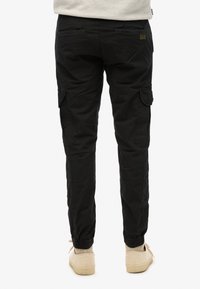 Superdry & Co PARA - Cargobroek - black