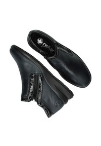 Bottes noires en cuir jusqu'à la cheville avec un panneau latéral texturé et à motifs et une fermeture éclair, dotées d'une pointe arrondie et d'une semelle rembourrée.