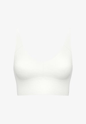 Brassière blanche sans couture avec larges bretelles, encolure arrondie et texture lisse. Présente des coutures minimales et un design ajusté sans armatures.
