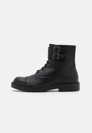 Botines con cordones - black