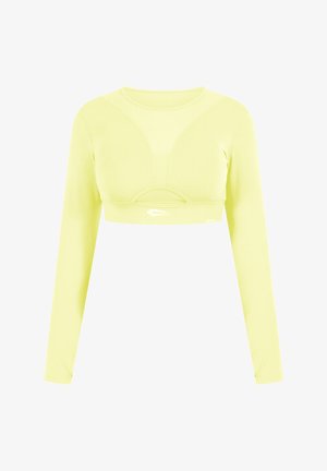 Crop top a maniche lunghe di un brillante giallo, realizzato in un tessuto liscio ed elastico. Caratterizzato da un collo rotondo e un dettaglio a taglio circolare sul davanti.