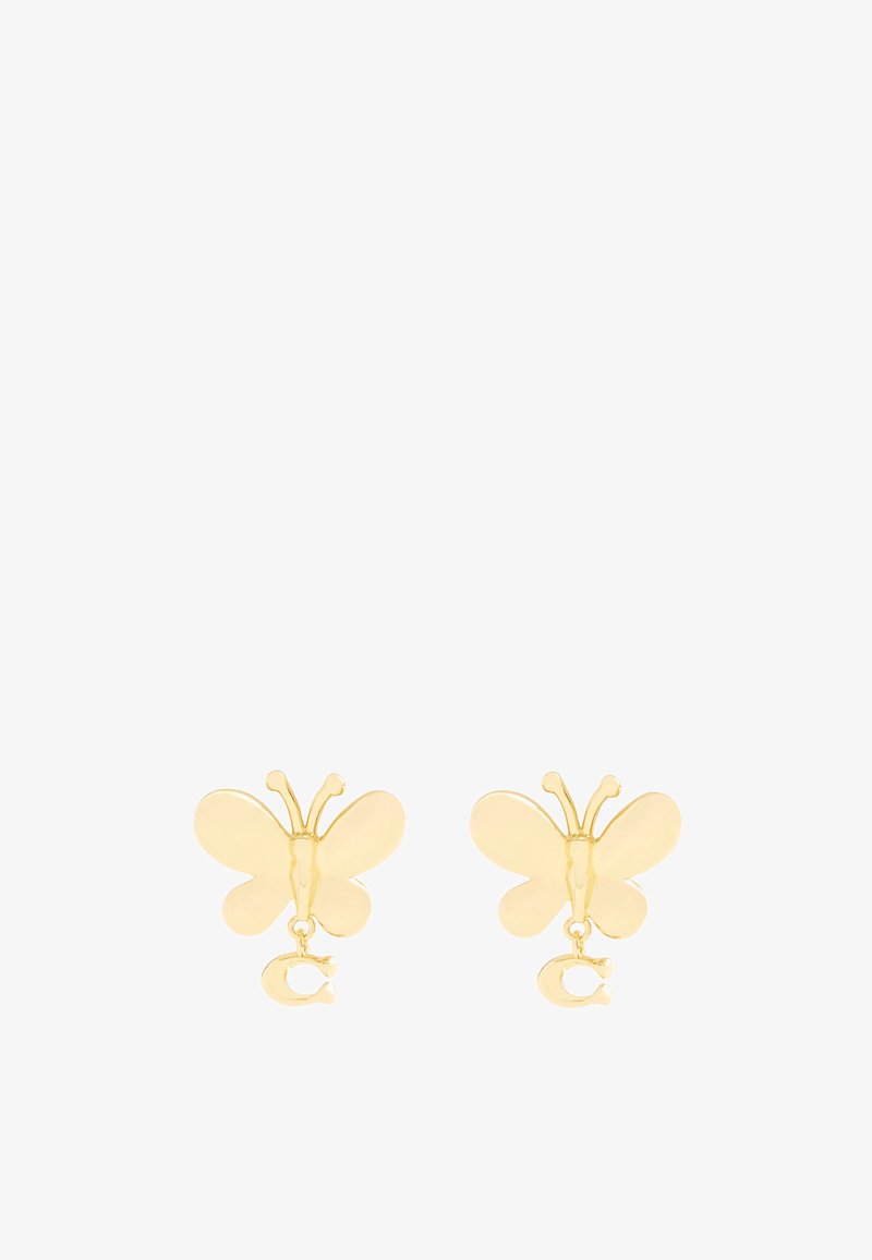 Boucles d'oreilles en or en forme de papillon, avec une surface lisse et des antennes délicates, mettant en avant un petit charm suspendu en forme de lettre "C."