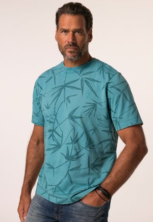 Turquoise short-sleeve t-shirt featuring a leaf pattern, crew neck, and a subtle logo on the chest. Fabric appears soft and lightweight.