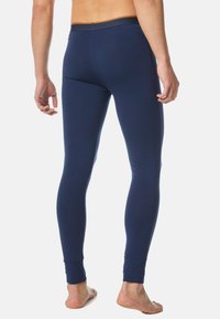 Navy-farbene enganliegende Leggings aus dehnbarem Stoff mit glatter Oberfläche, ausgestattet mit einem kontrastierenden elastischen Bund und Knöchelbündchen.