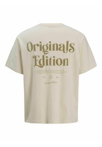 Kreminė medvilninė marškinė su laisvu siluetu. Spaudintas tekstas "Originals Edition" alyvuogių žalios spalvos ant nugaros, su papildomomis detalėmis apačioje.