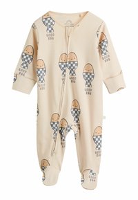 Babydräkt i persikofärg i mjukt tyg med en lekfull äggdesign och schackrutiga detaljer samt texten "Good Egg". Dragkedja framtill.