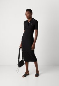 Lacoste Dzsörzéruha - black