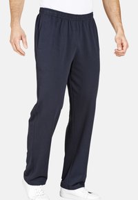 Marineblau Sporthosen mit elastischem Bund, Seitentaschen und lässiger Passform. Hergestellt aus weichem, dehnbarem Stoff für hohen Tragekomfort.