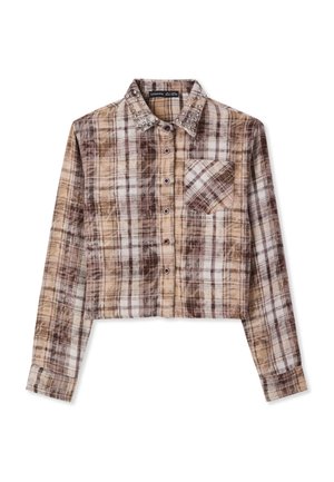 Camicia a scacchi cropped nei toni marrone e crema, con bottoni frontali, colletto con borchie e taschino sul petto. Tessuto morbido.