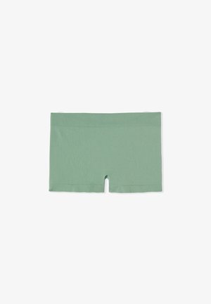 Pantaloncini in tessuto elasticizzato a coste verde chiaro senza cuciture, con una fascia in vita ampia e aperture corte sulle gambe.