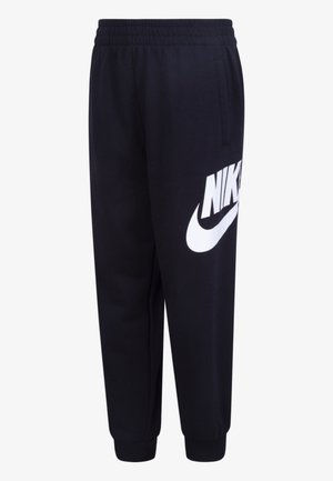Czarne spodnie dresowe Nike z elastycznym pasem i ściągaczami, kieszeniami bocznymi oraz dużym białym logo Nike na górnej części uda.