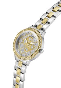 Gold and silver stainless steel watch with a jeweled bezel, patterned silver dial, and gold accents on the face and strap links.