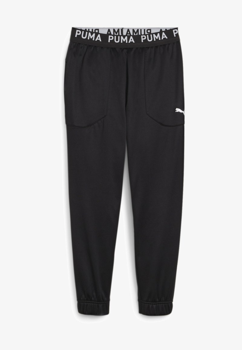 Black athletic pants with elastic waistband featuring white "PUMA" logo. Includes two side pockets and elastic cuffs at the ankles.