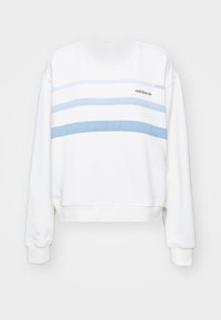 Vit kort sweatshirt med ljusblå horisontella ränder. Mjuk fleece-material, rund halsringning och ribbade muddar. Varumärkeslogotyp vid bröstet.