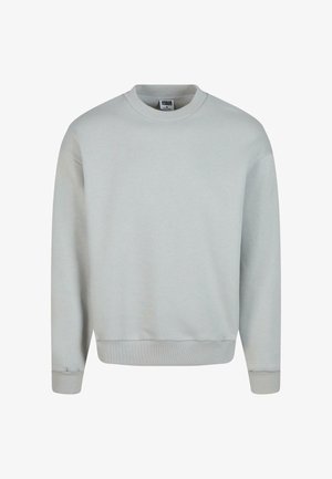 Hellgrauer Sweatshirt aus einem Baumwoll-Mix. Mit Rundhalsausschnitt, langen Ärmeln sowie gerippten Bündchen und Saum.