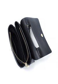 Black textured leather bag with a flap closure, gold hardware, multiple interior compartments, and one zipper pocket.