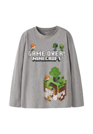 Chemise grise à manches longues avec des personnages de Minecraft et un terrain en blocs, avec le texte "GAME OVER! MINECRAFT" au-dessus des figures pixellisées.