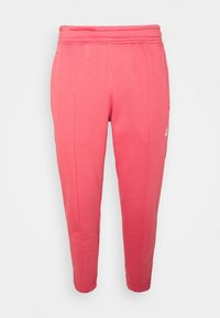 Rosa joggerbyxor gjorda av mjukt tyg, med dragsko i midjan, snäva ben och minimal logotypdetalj på vänster sida.