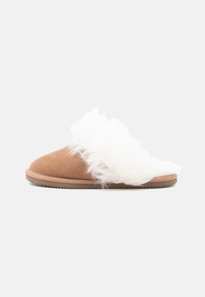 Brown suede slipper with white fluffy fur lining and treaded sole, shown in side profile on white background.