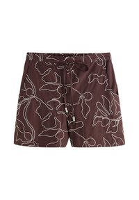 Shorts marron avec motifs floraux abstraits blancs en lignes et taille à cordon devant sur fond blanc.