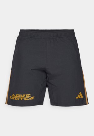 Schwarze Sportshorts mit einem elastischen Bund. Mit gelbem Grafiktext "LOVE UNITES" auf dem linken Bein und einem kleinen Logo auf der rechten Seite.