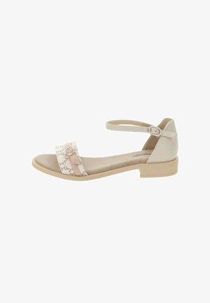 Sandal beige chiaro con una fascia per le dita decorata, cinturino alla caviglia regolabile, tacco basso e superficie liscia. Presenta un accento con fibbia sicura.