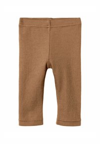 Leggings marron à côtes en matériau doux, avec une taille élastique et un design longueur cheville avec des coutures surpiquées.