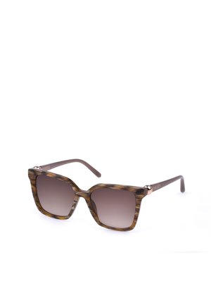 Lunettes de soleil carrées avec des montures écaille de tortue marron et des verres dégradés foncés, nom de la marque Furla sur la branche.