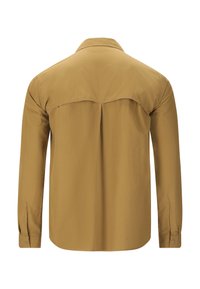 Langarmshirt in mosterdgeel, gemaakt van gladde stof. Heeft een puntkraag, een yoke-detail en knoopmanchetten.