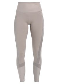 Leggings grigi chiari realizzati in tessuto elasticizzato, con vita alta, pannelli laterali testurizzati e dettagli di cucitura in contrasto.