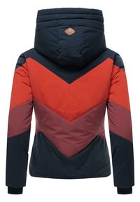 Jachetă puffer colorată, cu un model în zigzag în nuanțe de bleumarin, roșu și burgundy, având o glugă detașabilă și manșete ribbate pentru confort.