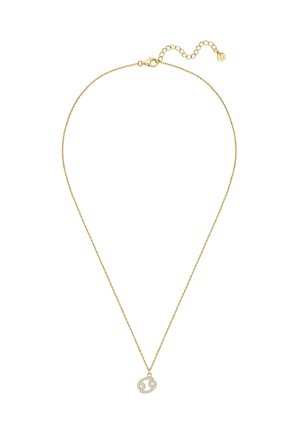 Collier en chaîne en or présentant un pendentif zodiacal rond orné de petites pierres précieuses claires, offrant une apparence délicate et raffinée.