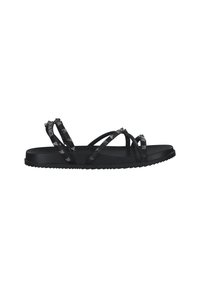 Black sandal with multiple crossed straps, featuring a textured pattern and flat sole. The outsole has a slight tread for grip.