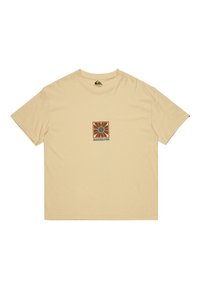 Rövid ujjú bézs póló, puha anyagból, középen napgrafikával és barna, valamint szürke "Quiksilver" felirattal.