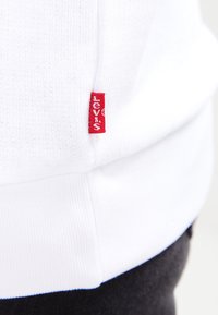 Levi's® RELAXED GRAPHIC CREW - Sudadera - better batwing white