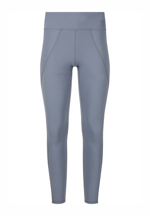 Grijze leggings van lichte kleur, hooggesneden en tot op de enkels, met zichtbare naaddetails langs de heupen en de binnenkant van de benen, ontworpen voor sportkleding.