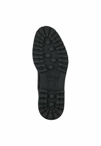 Sola di scarpa in gomma nera con scanalature profonde e motivi circolari per una maggiore aderenza. Presenta una superficie texturizzata per una maggiore durata e trazione.