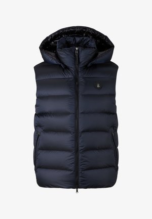 Marineblauw gewatteerd vest met een hoge kraag, ritssluiting aan de voorkant en zijzakken. Voorzien van doorgestikte vulling en een rond logo op de borst.