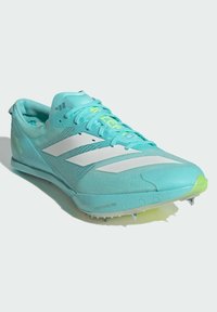Lightweight turquoise sprinting shoes with white stripes, breathable mesh upper, and spike outsole for traction; notable “LIGHTSTRIKE PRO” branding.