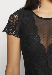 Morgan DONAO - Camiseta estampada - noir